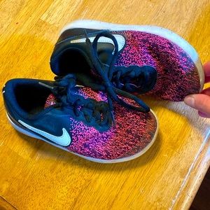 Girls size 12.5 pink black and white Nike sneakers